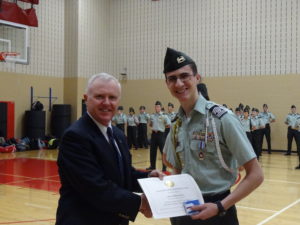 COL(Ret) Ed Murdock presenting the AUSA Medal to Cadet Phillip Pacheco, Cumberland Valley HS JROTC.