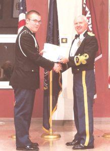 COL(Ret) Ed Murdock (still looking good in uniform) presenting the AUSA Medal to Cadet Karl Shanoltz, Gettysburg HS JROTC.